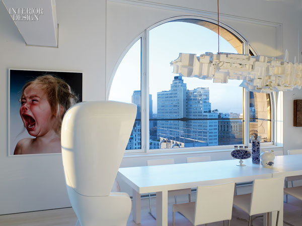 dining room-Jason_Rogenes_s_pendant_fixture_floats_above_the_dining_area_s_custom_UM_Project_table_and_Antonio_Citterio_chairs_